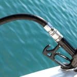 What should you do before fueling your boat?